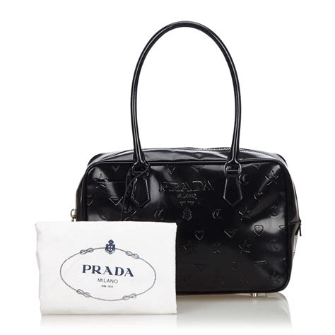 late embossed facing prada logo vintage bag|prada purses for sale.